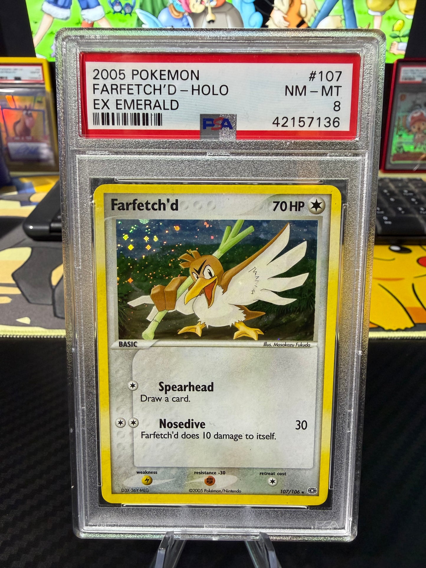 PSA 8 - Farfetch’d Holo - 107/106 - Ex Emerald
